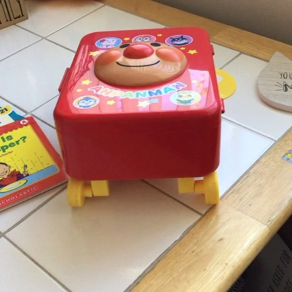 Red Rolling Suitcase with 9 Scholastic Books - Picture 6 of 7